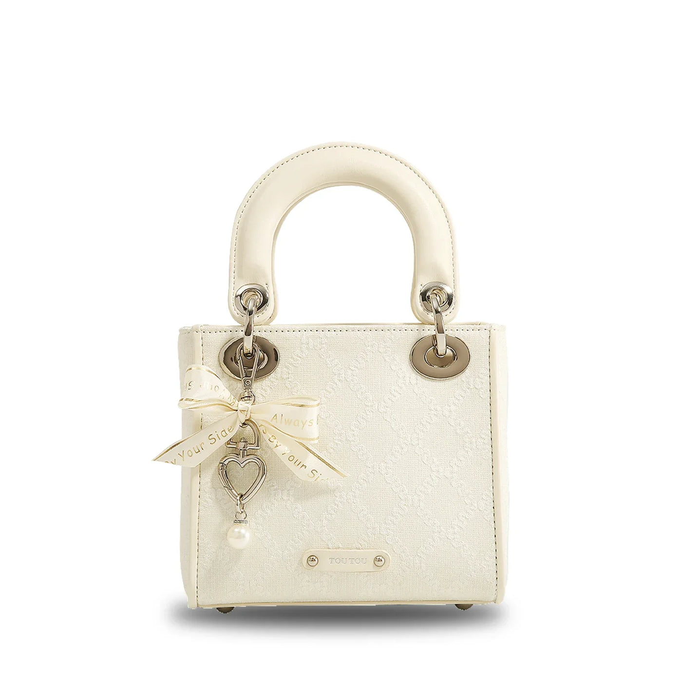 Clarisse Bow Jacquard Handbag in ivory white with ribbon bow and pearl charm, designed with a textured jacquard finish and compact silhouette.